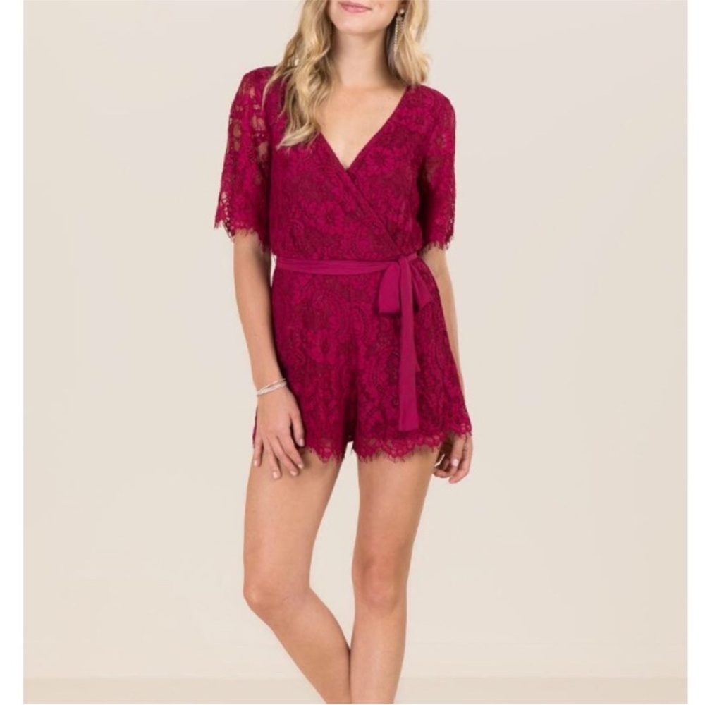Francesca's Collections Baby Pink Lace Wrap Romper